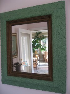 Antique mirror frame with leaf detail 